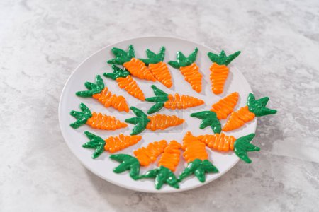 Photo for Chocolate carrot cake toppers on a white plate. - Royalty Free Image