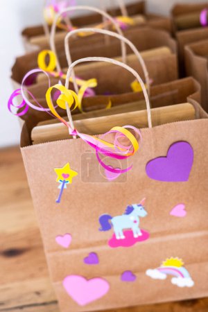 Photo for Party favors bags at the little girls Birthday party. - Royalty Free Image