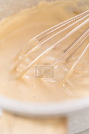 Photo for Cooking Swedish meatball sauce in a nonstick cooking pot. - Royalty Free Image