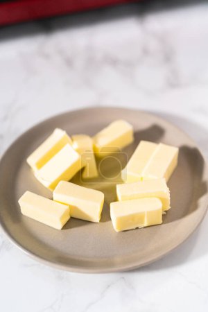 Photo for Softened sticks of unsalted butter on in the microwave. - Royalty Free Image