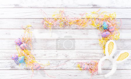 Photo for Flat lay. Assembling charcuterie board with Easter candies, cookies, and marshmallows. - Royalty Free Image