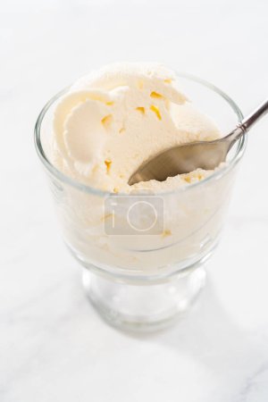 Photo for Homemade whipped cream in a class ice cream bowl. - Royalty Free Image