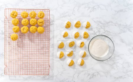 Photo for Lemon Cookies with White Chocolate. Flat lay. Dipping lemon cookies into melted white chocolate. - Royalty Free Image