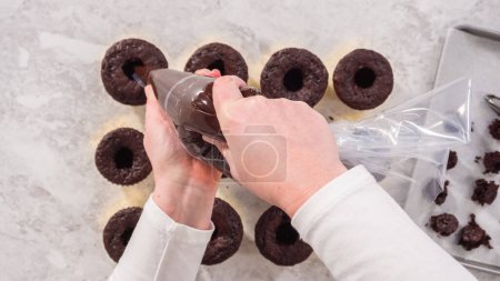 Photo for Flat lay. Step by step. Filling in chocolate cupcakes with chocolate ganache. - Royalty Free Image