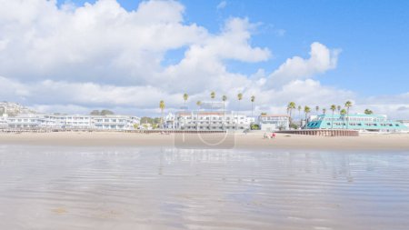 Photo for Pismo Beach, California, USA-December 5, 2022-Taking a serene winter walk along the sandy shores of Pismo Beach, the crisp air and gentle waves create a refreshing and peaceful atmosphere. - Royalty Free Image