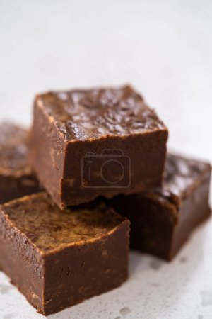 Photo for Homemade chocolate peanut butter fudge pieces on the kitchen counter. - Royalty Free Image