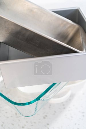 Photo for Variety of clean baking pans on the kitchen counter. - Royalty Free Image