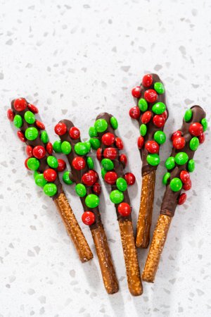 Photo for Denver, Colorado, USA-December 18, 2022-Chocolate-covered pretzels on a kitchen counter. - Royalty Free Image