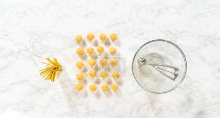 Photo for Flat lay. Scooping dough with dough scoop to make cactus cake pops for the Cinco de Mayo celebration. - Royalty Free Image