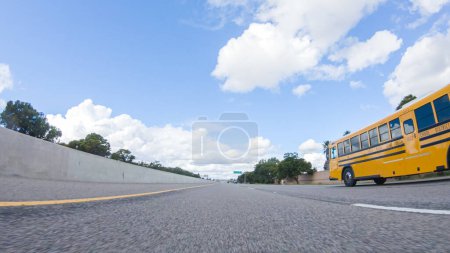 Photo for Santa Maria, California, USA-December 6, 2022-On a clear winter day, a car smoothly travels along Highway 101 near Santa Maria, California, under a brilliant blue sky, surrounded by a blend of - Royalty Free Image