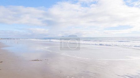 Photo for The expansive sands of El Capitan State Beach in California lie empty and tranquil during the winter. - Royalty Free Image
