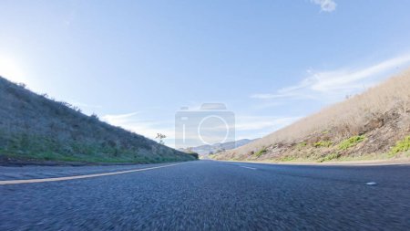 Photo for During the day, driving on HWY 101 near Arroyo Quemada Beach, California, offers scenic views of the surrounding coastal landscape. - Royalty Free Image