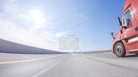 Photo for HWY 15, California, USA-December 3, 2022-Embarking on a road trip from Nevada to California, driving on Highway 15 during the day offers scenic views and an exciting journey between states. - Royalty Free Image