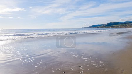 Photo for The expansive sands of El Capitan State Beach in California lie empty and tranquil during the winter. - Royalty Free Image