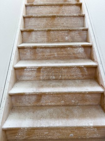 Captured in the midst of a home remodeling project, this staircase is prepared for new flooring, symbolizing a transition and the promise of renewal.