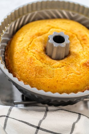 Allowing the freshly baked bundt cake to gradually cool down prior to extracting it from the pan is an essential step in the process.