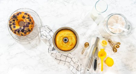 Flat lay. Allowing the freshly baked bundt cake to gradually cool down prior to extracting it from the pan is an essential step in the process.