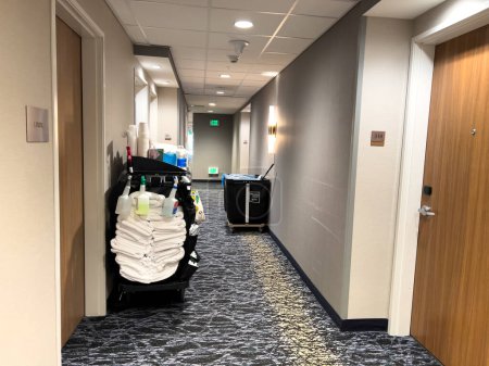 Photo for Ft. Collins, Colorado, USA-April 6, 2024-Experience our meticulous cleaning service in the hotel hallway, guaranteeing a pristine and inviting atmosphere for guests. We prioritize cleanliness and - Royalty Free Image