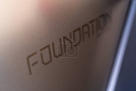 Photo for Denver, Colorado, USA-May 5, 2024-This close-up image captures the intricately etched Foundation inscription on the body of a Tesla Cybertruck, emphasizing the vehicle unique branding and sleek design - Royalty Free Image
