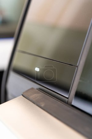 Photo for Denver, Colorado, USA-May 5, 2024-This image provides a close-up look at a car door opener, showcasing the clean lines and modern design typical of contemporary vehicle interiors. The focus on the - Royalty Free Image