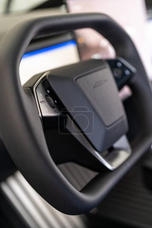 Photo for Denver, Colorado, USA-May 5, 2024-This image features a detailed close-up of the unique, minimalist steering wheel design of a Tesla Cybertruck, highlighting its sleek controls and futuristic - Royalty Free Image
