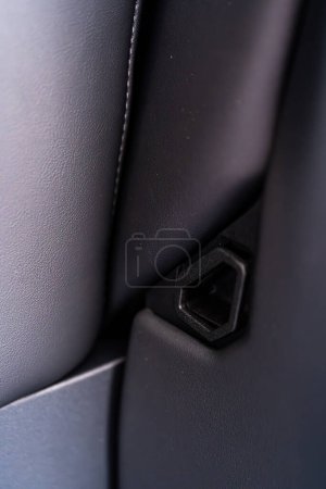 Photo for Denver, Colorado, USA-May 5, 2024-This image shows a detailed view of the back seat release pull strap in a Tesla Cybertruck, emphasizing the subtle yet functional design integrated within the vehicle - Royalty Free Image