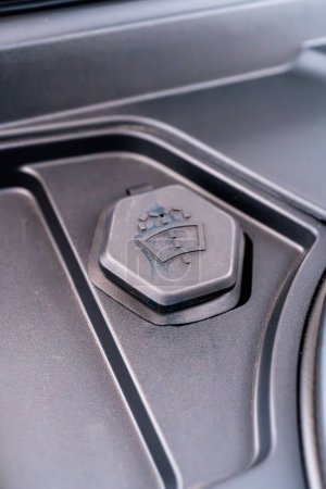 Photo for Denver, Colorado, USA-May 5, 2024-This image shows a detailed close-up of the windshield washer fluid cap in a Tesla Cybertruck, highlighting the unique design and branding elements typical of Tesla - Royalty Free Image