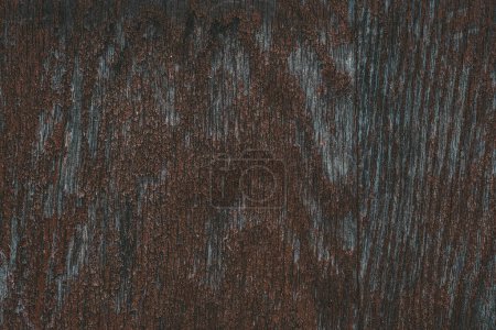 Photo for Detailed view of the texture and grains of a wooden surface, showcasing the natural patterns and imperfections of the wood. - Royalty Free Image