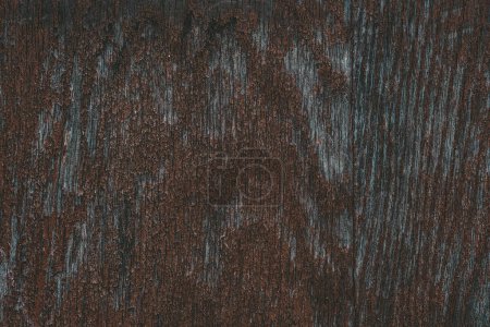 Photo for Detailed view of the texture and grains of a wooden surface, showcasing the natural patterns and imperfections of the wood. - Royalty Free Image