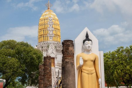 An old standing Buddha situated in Wat Phra Sri Rattana Mahathat temple in Phitsanulok province of Thailand.