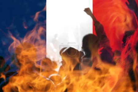 Photo for Protests France Paris. France flag. Protest in France. Rise hand. Pension reforms. Retirement age. Bastille day. Fireplace anarchy. Out of focus. - Royalty Free Image
