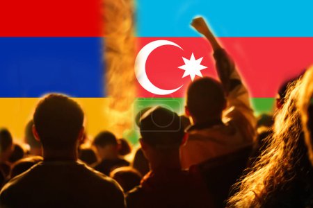 Defocus war. Conflict between Armenia and Azerbaijan over Nagorno-Karabakh. Lets stop the war. Azerbaijan and Armenia conflict. Country flags on flame background. Out of focus.