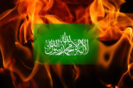 Photo for Flag Hamas on the fire flame. Hamas between Israel and Palestine. Israel Palestine war. World crisis in Middle East. Rebellion. Support terrorism. - Royalty Free Image