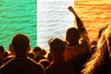 Ireland protest. Protests Dublin. People rise hand. Ireland flag. Street riot. Demonstration. Out of focus.