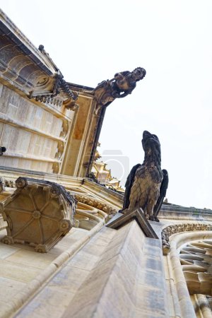 The traditional architecture of Gothic churches is adorned with intricate details, and atop them, chimeras stand guard, believed to scare away malevolent spirits.