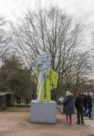 Wakefield, UK - May 29, 2023: Erwin Wurm bronze Balzac (2023) sculpture shown for the first time - the majestic human form created by elaborate layers of robes at the YSP.
