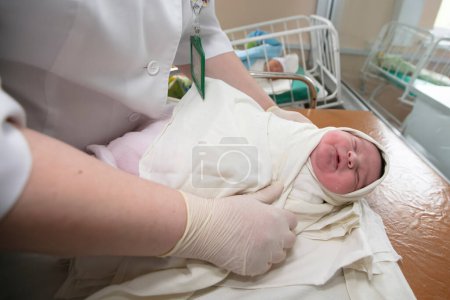 Photo for Neonatology. A newborn in a special incubator. medical staff caring for a newborn in the hospital. - Royalty Free Image