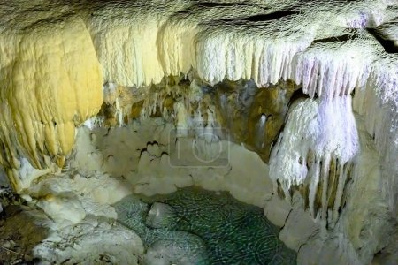 Photo for New Athos cave with stalactites and stalagmites in Abkhazia. The huge underground cave. - Royalty Free Image