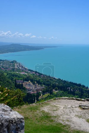 New Athos, Abkhazia, Georgia - July 04, 2022: Ruins of Anacopia Fortress at the top of the Iverian Mountain in New Athos, Abkhazia.