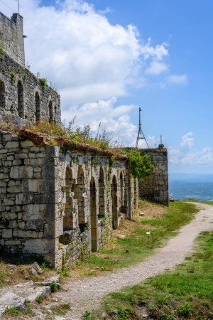 New Athos, Abkhazia, Georgia - July 04, 2022: Ruins of Anacopia Fortress at the top of the Iverian Mountain in New Athos, Abkhazia.