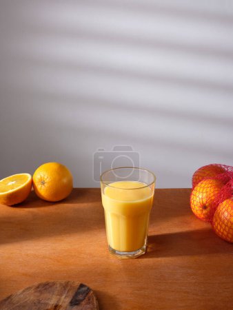 Photo for Freshly pressed orange juice for breakfast - Royalty Free Image