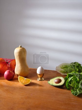 Foto de Fresh groceries on the kitchen counter. Food delivery concept. Vegetarian food ingredients - Imagen libre de derechos