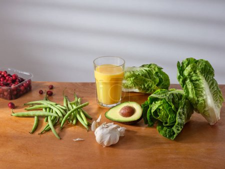Téléchargez les photos : Fresh groceries on the kitchen counter. Food delivery concept. Vegetarian food ingredients - en image libre de droit