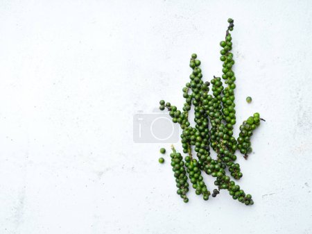 Photo for Green peppercorns on light background - Royalty Free Image