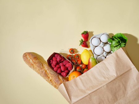 Photo for Full paper grocery bag with healthy products. Organic food concept, copy space - Royalty Free Image