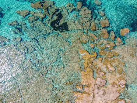 Photo for Turquoise water in La Speranza beach  seen from above. Sardinia, Italy - Royalty Free Image