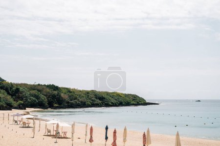 Photo for Kenting Small Beach and parasol in Kenting, Taiwan - Royalty Free Image