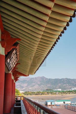 Photo for Jinhaeru Korean traditional pavilion and beach park view in Changwon, Korea - Royalty Free Image