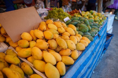 Ripe mangoes at the roadside local market 