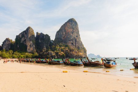 Photo for Boats and rocky mountains at Railay beach - Royalty Free Image